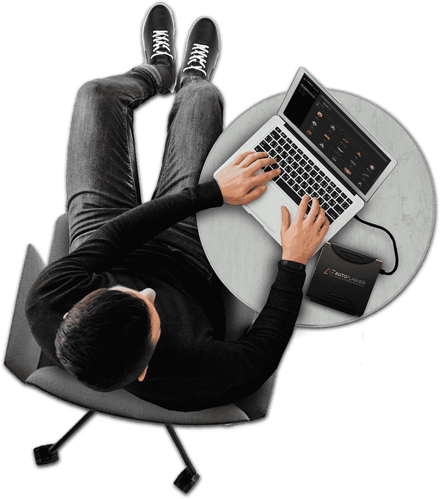 young man working laptop sitting black sofa whitenew floor
